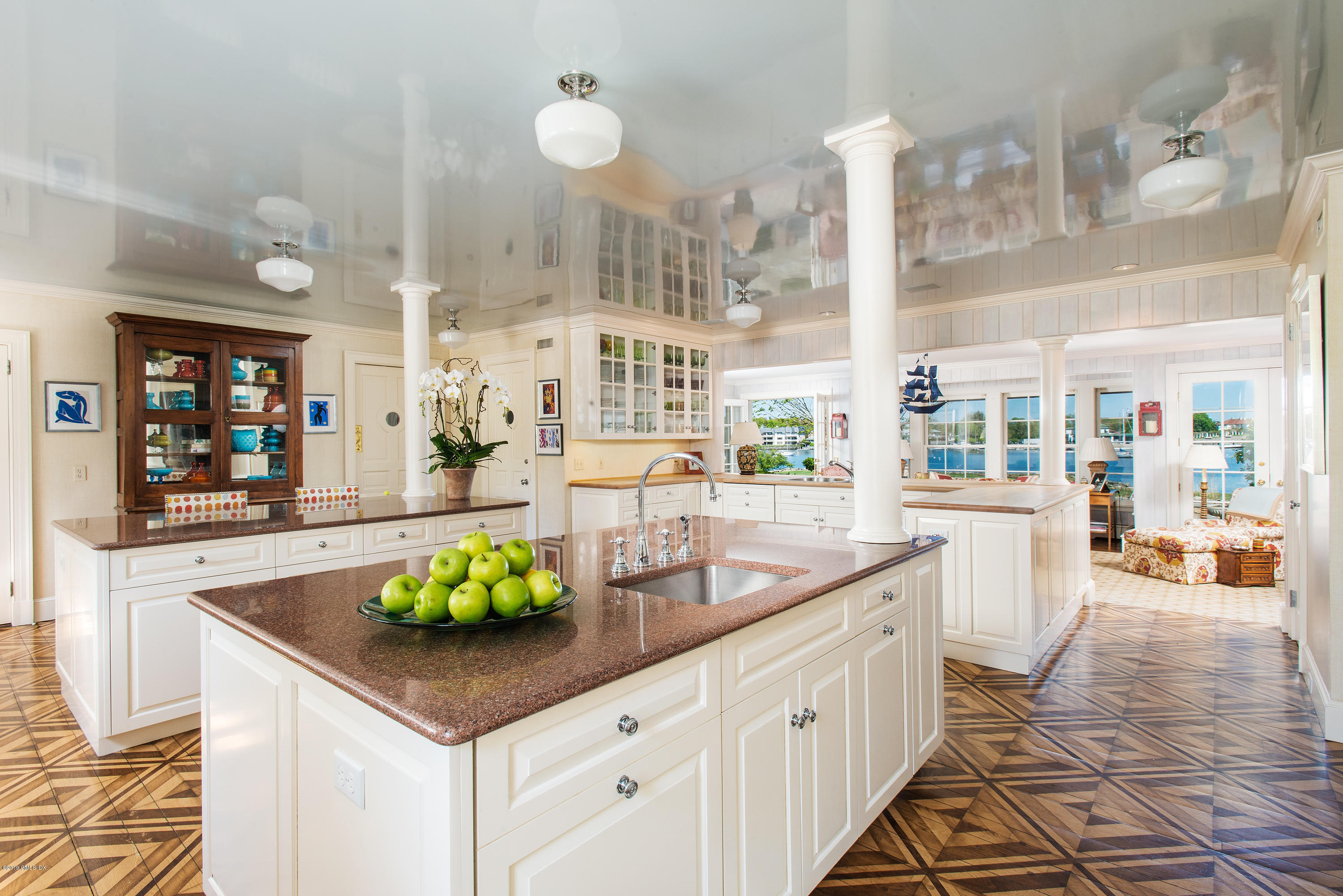 23 Smith Road Greenwich, CT 06830 - Photo 12 of 52 a kitchen with stainless steel appliances a sink and cabinets