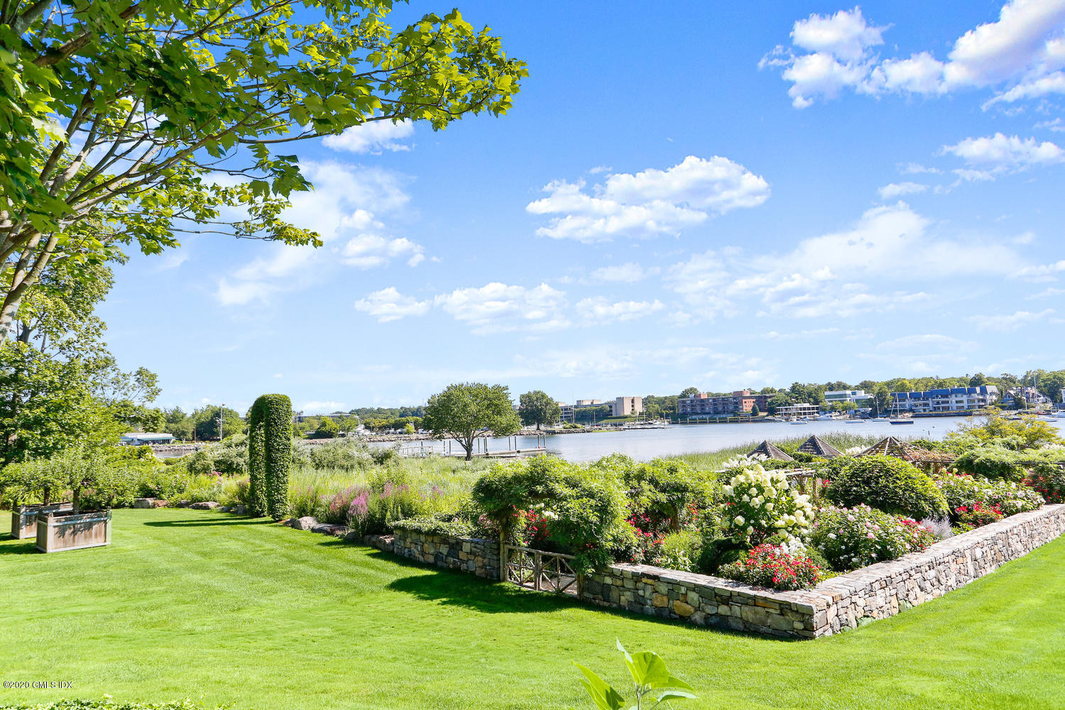 23 Smith Road Greenwich, CT 06830 - Photo 41 of 52 a view of a lake with a big yard