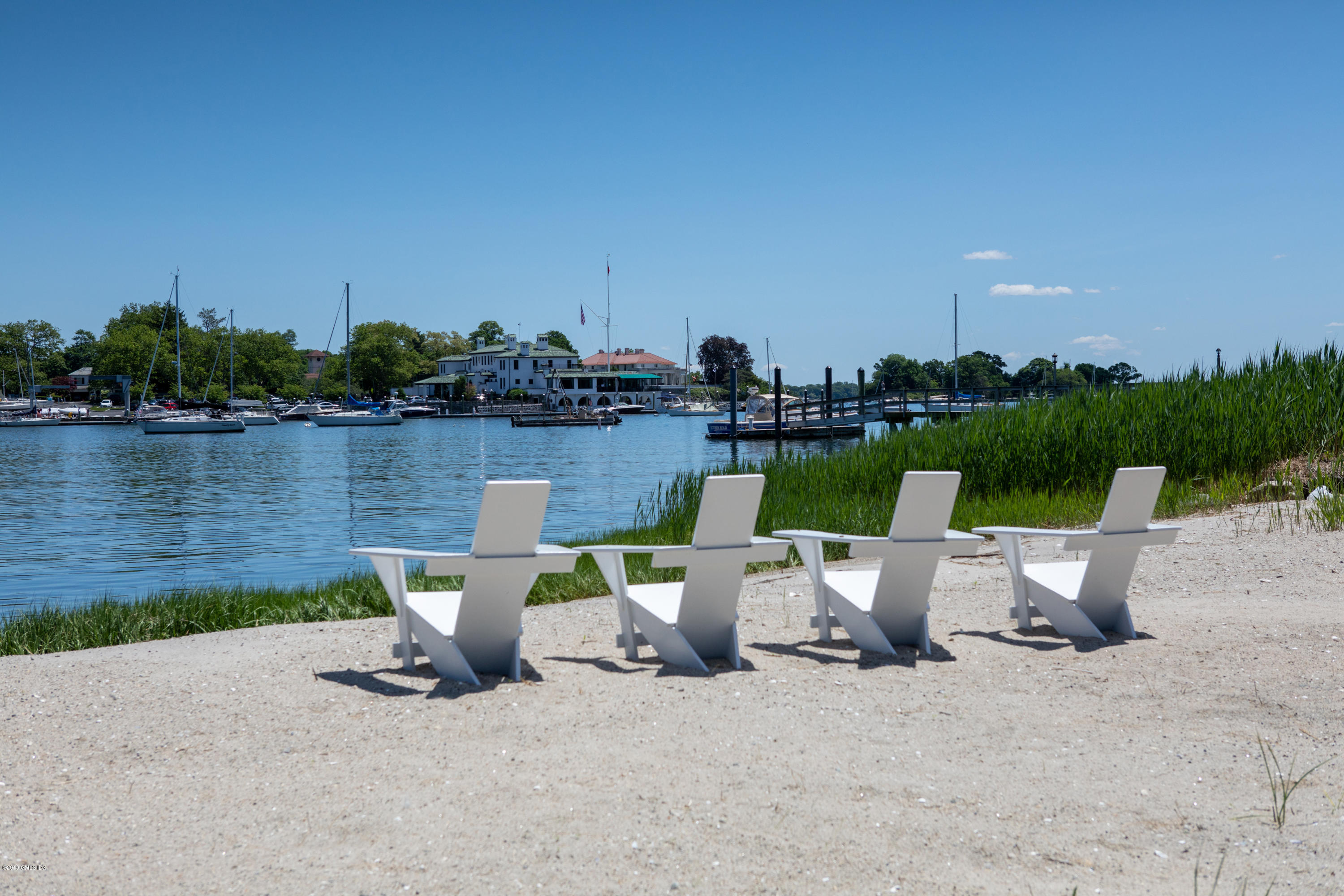 23 Smith Road Greenwich, CT 06830 - Photo 47 of 52 a view of a lake with furniture