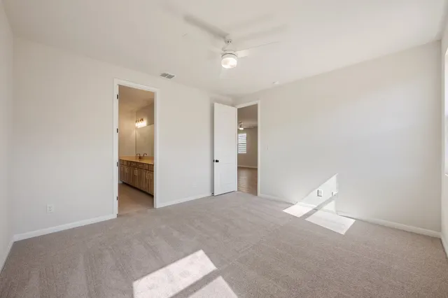 a bathroom with a double vanity sink mirror and double