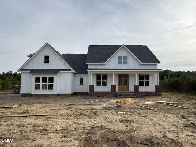 8 Trey Point Dr Spring Spring Hope, NC 27882 - Photo 29 of 31 a front view of a house with a garden