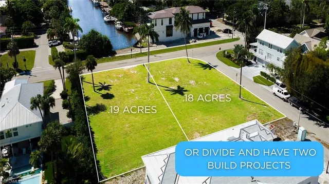 a view of a swimming pool with a patio and couches