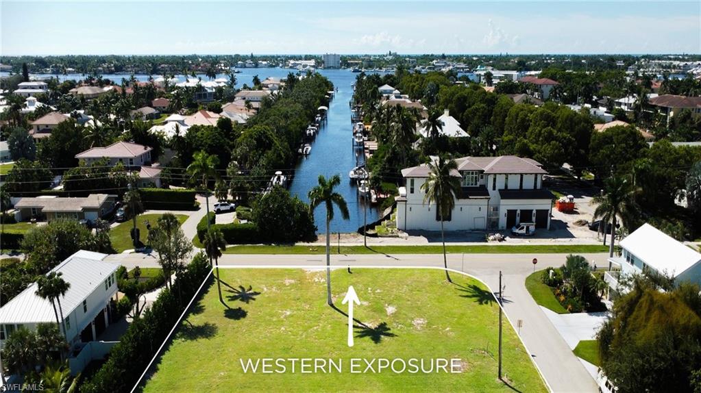 1427 Sandpiper Street Naples, FL 34102 - Photo 3 of 6 an aerial view of a house with swimming pool