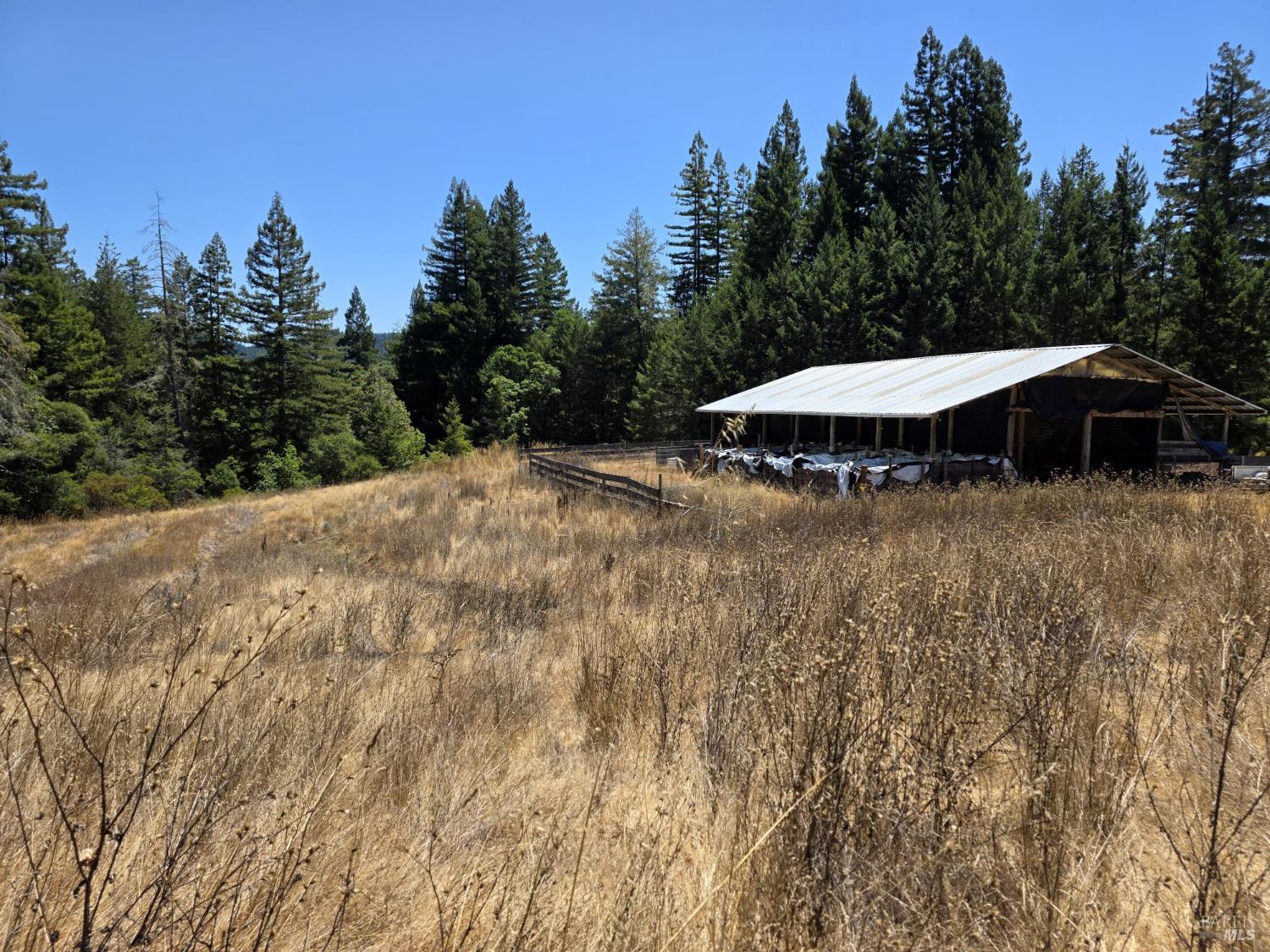 13333 Low Gap Road Ukiah, CA 95482 - Photo 24 of 50 a view of a house with yard and sitting area
