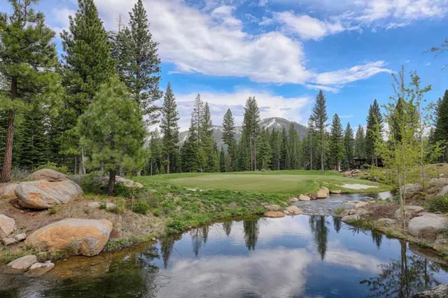 a backyard of a house with yard barbeque oven and outdoor seating