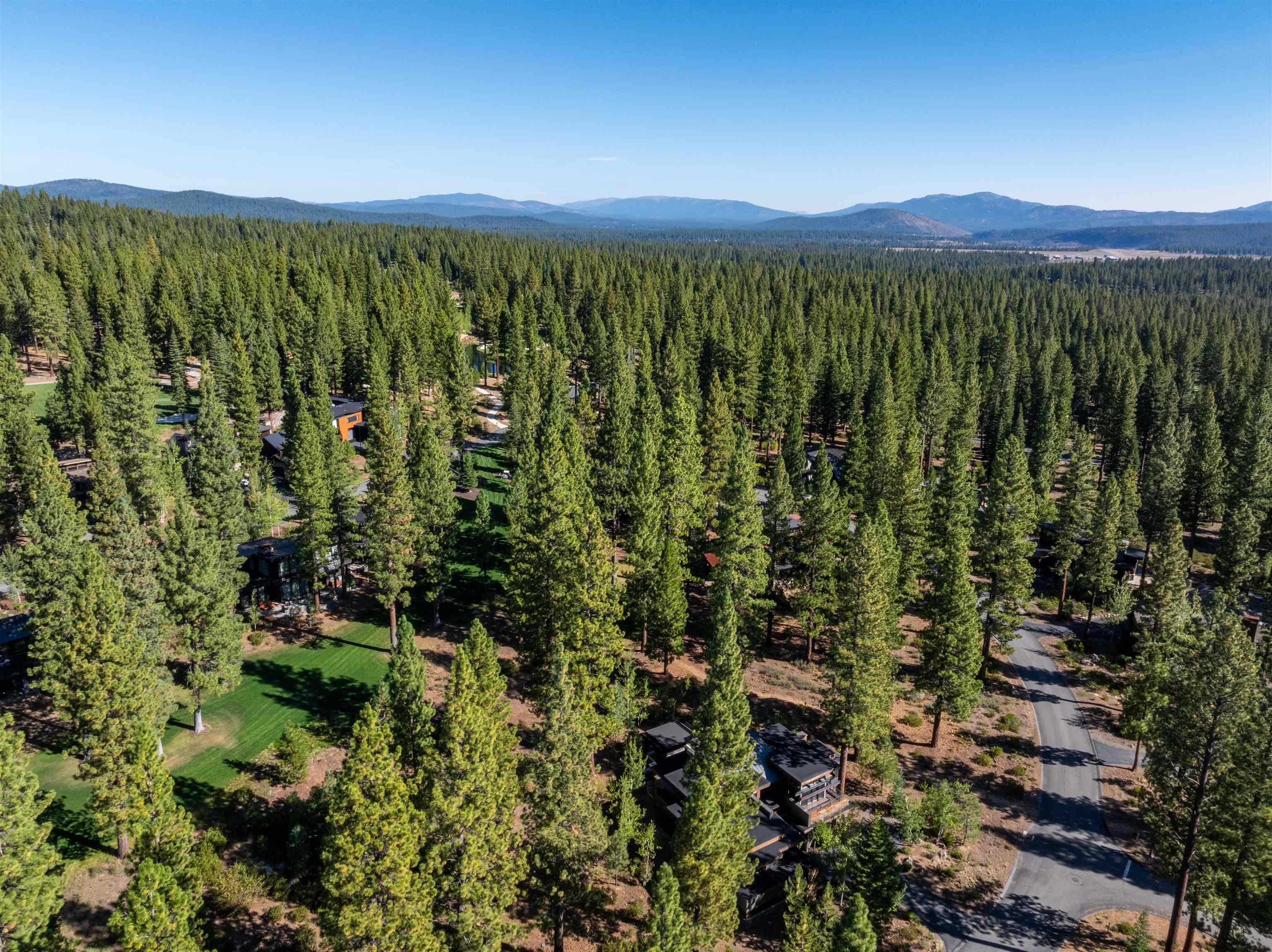 8331 Thunderbird Circle Truckee, CA 96161 - Photo 9 of 25 a view of a city with lush green forest