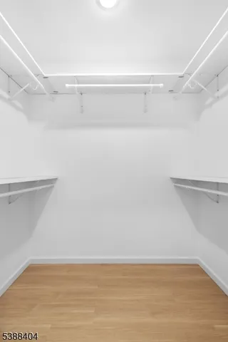 a view of an empty walk in closet