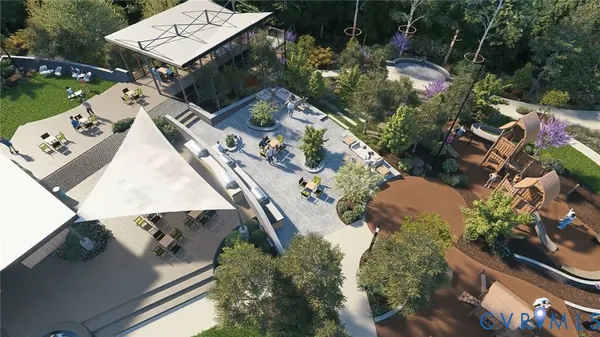 a view of a house with a big yard and large trees