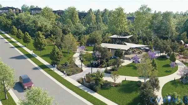 an aerial view of a house with a yard swimming pool and outdoor seating