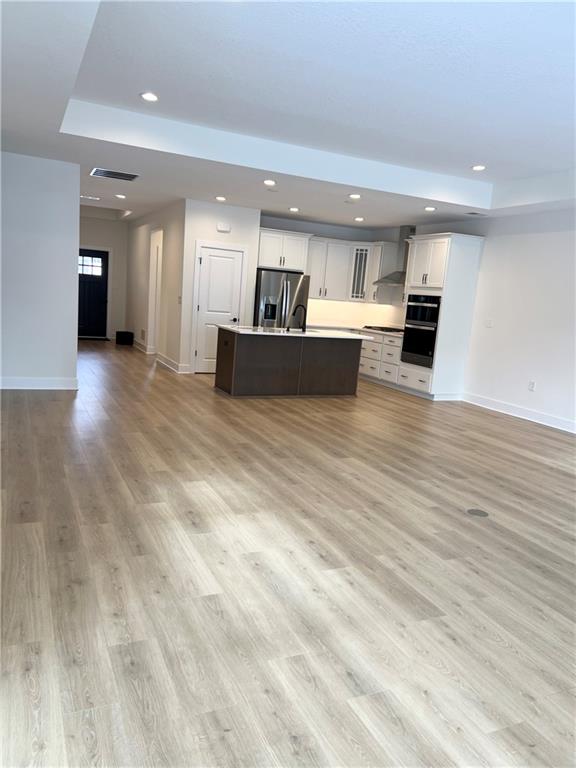 107 Hemingway Lane Coraopolis, PA 15108 - Photo 19 of 32 a view of a kitchen with kitchen island a counter top space and cabinets