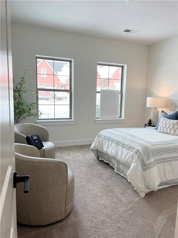 107 Hemingway Lane Coraopolis, PA 15108 - Photo 26 of 32 a bed sitting in a bedroom next to a window