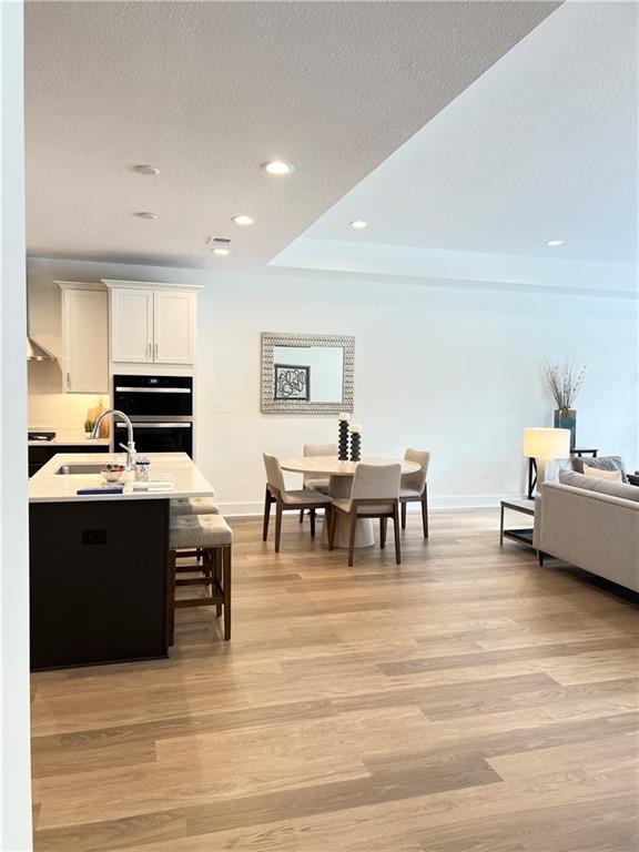 107 Hemingway Lane Coraopolis, PA 15108 - Photo 28 of 32 a living room with furniture and a kitchen view