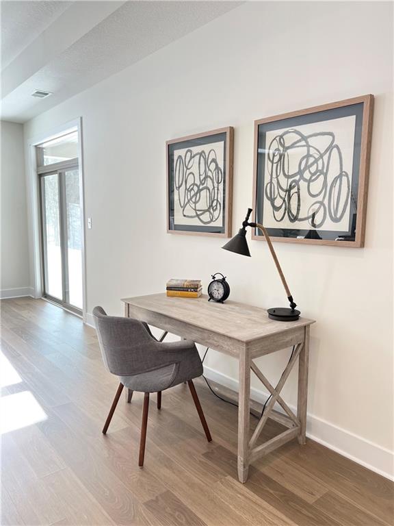 107 Hemingway Lane Coraopolis, PA 15108 - Photo 30 of 32 a view of a dining room with furniture and wooden floor