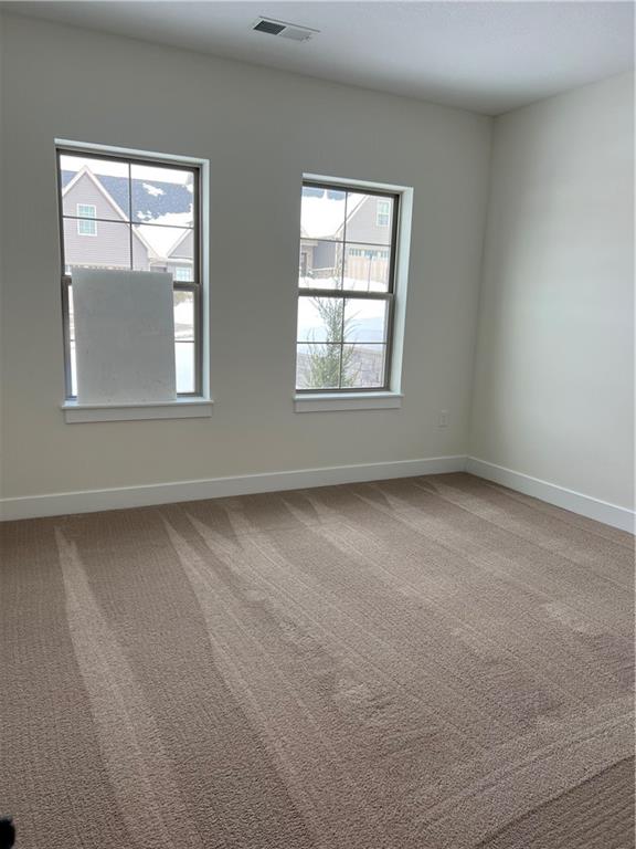 107 Hemingway Lane Coraopolis, PA 15108 - Photo 6 of 32 an empty room with a window