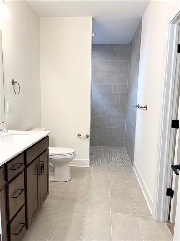107 Hemingway Lane Coraopolis, PA 15108 - Photo 9 of 32 a bathroom with a sink a toilet and shower
