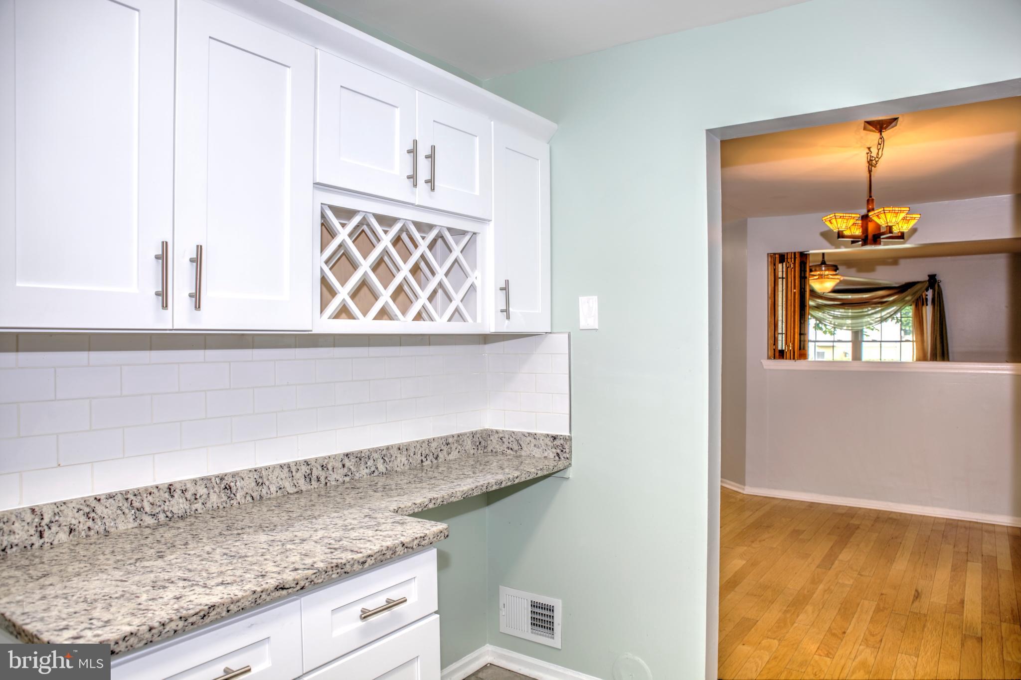 63 Allison Road Hightstown, NJ 08520 - Photo 8 of 25 Newer Kitchen with Built-in Wine Rack
