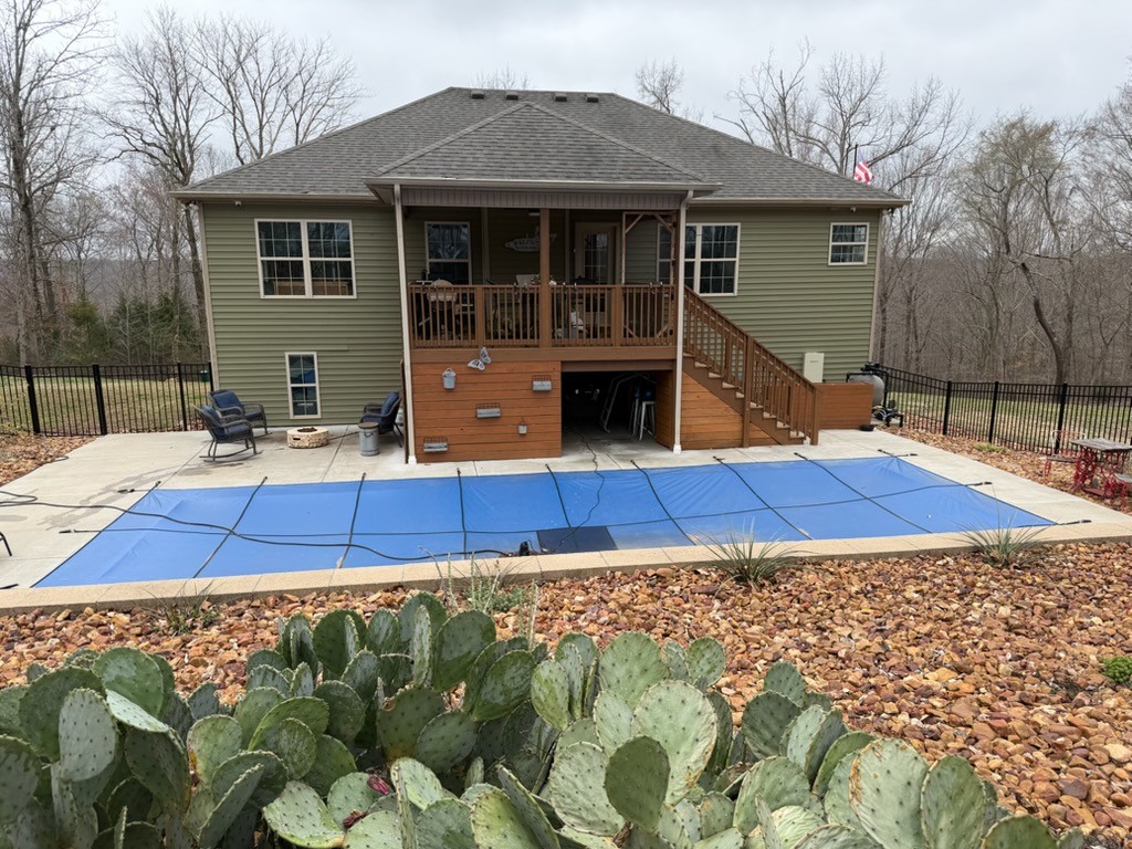 2675 Mockingbird Hill Road Palmyra, TN 37142 - Photo 2 of 2 a view of a house with a patio