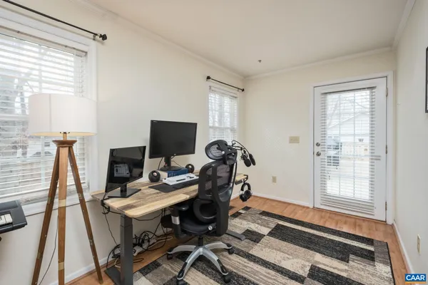 a workspace with furniture and a window