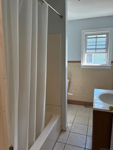 a bathroom with a bathtub