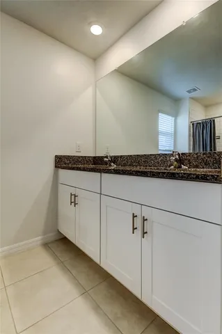 a bathroom with a shower and a toilet