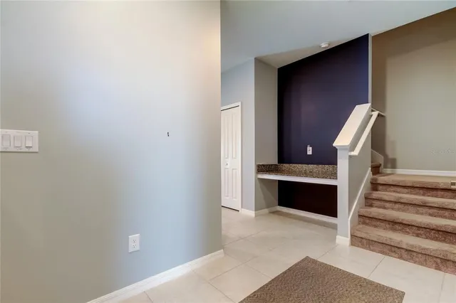 a view of a hallway with entryway