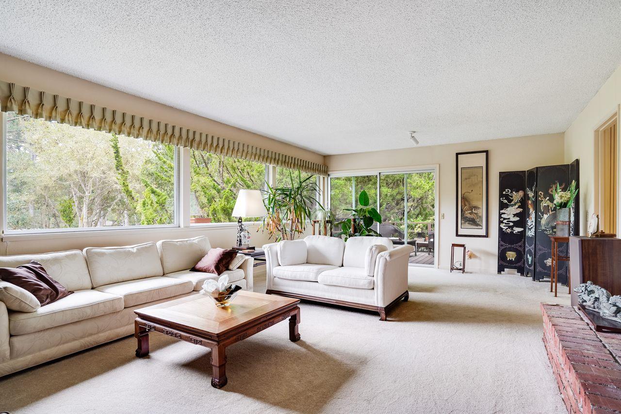 3 Forest Knoll Road Monterey, CA 93940 - Photo 25 of 63 a living room with furniture and a large window