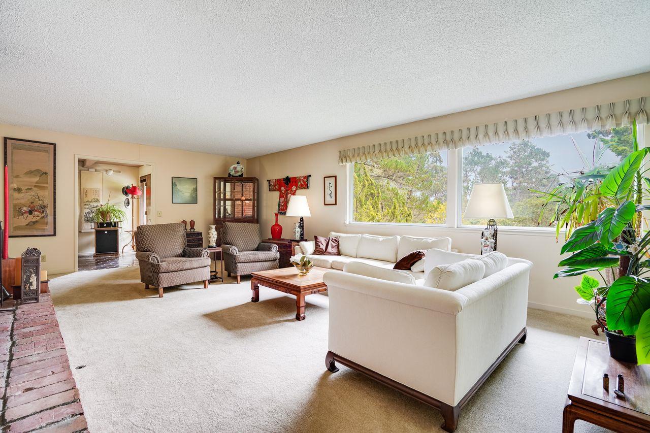 3 Forest Knoll Road Monterey, CA 93940 - Photo 26 of 63 a living room with furniture and a large window