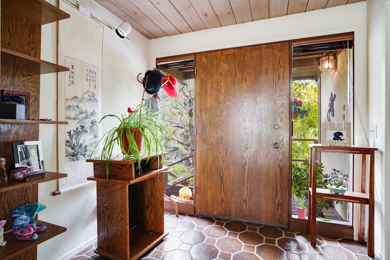 3 Forest Knoll Road Monterey, CA 93940 - Photo 30 of 63 a room that has a bed and a table in it