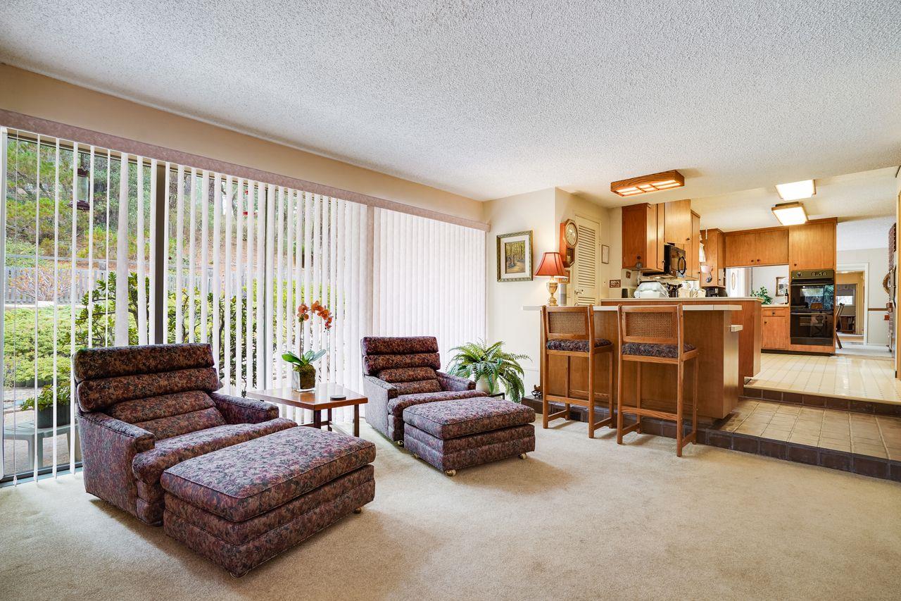 3 Forest Knoll Road Monterey, CA 93940 - Photo 34 of 63 a living room with furniture and a large window