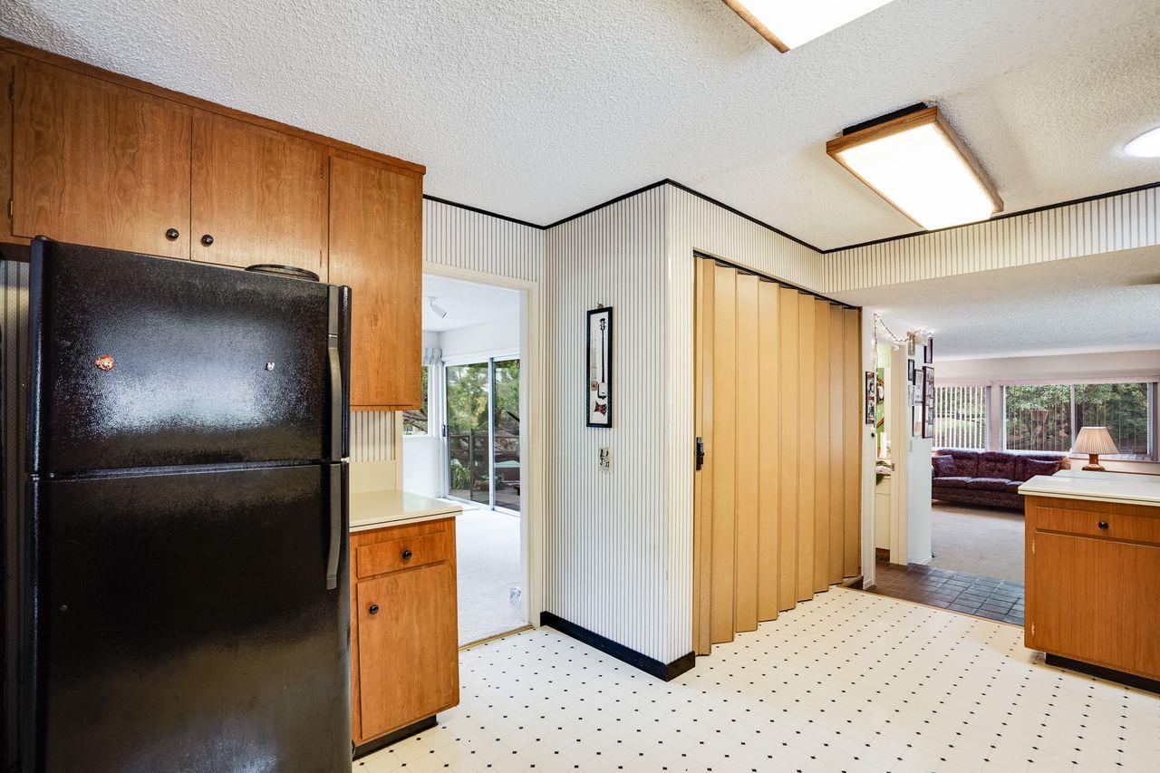 3 Forest Knoll Road Monterey, CA 93940 - Photo 40 of 63 a view of a refrigerator in kitchen and living room