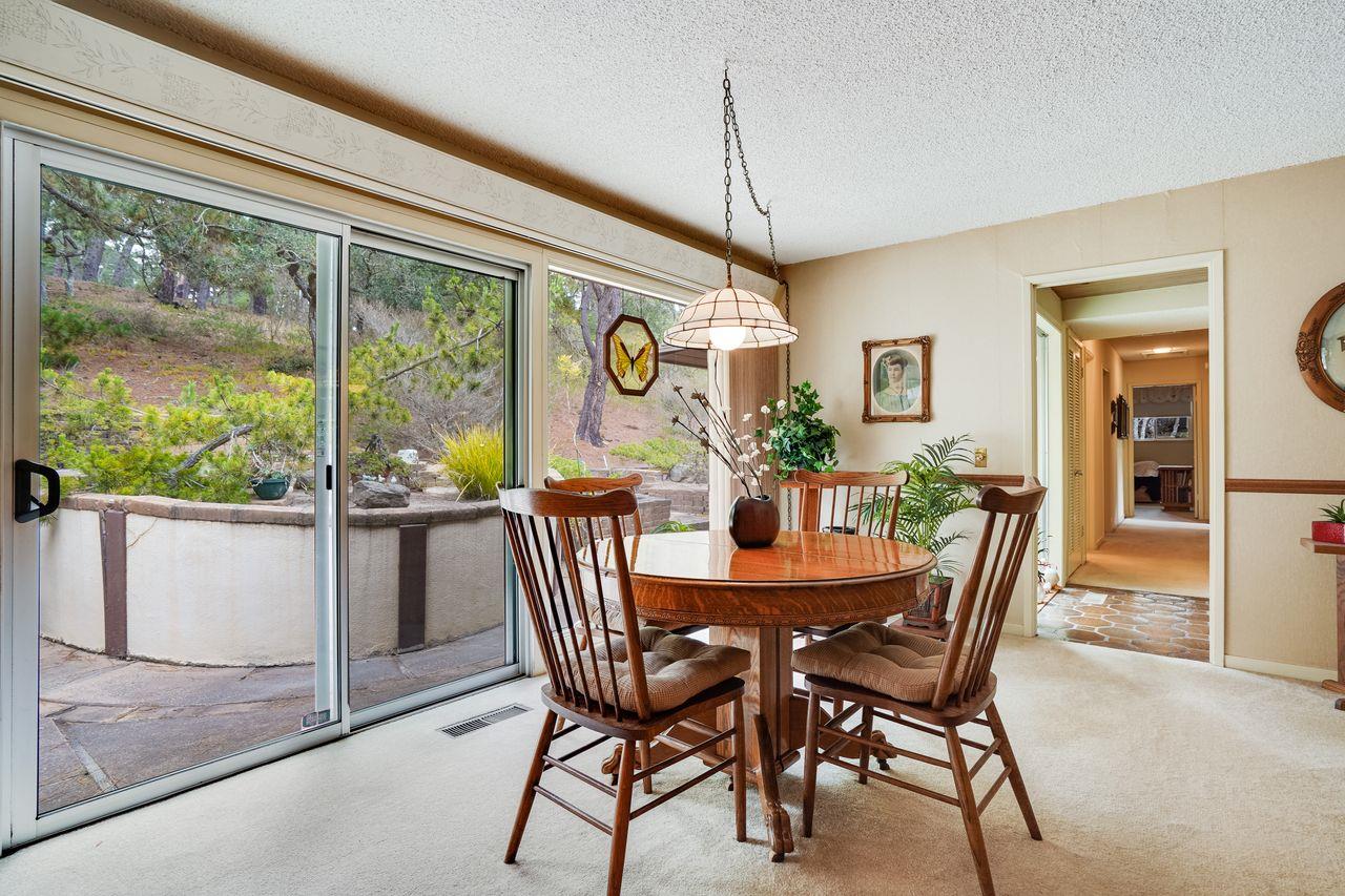 3 Forest Knoll Road Monterey, CA 93940 - Photo 44 of 63 a view of a dining room with furniture window and outside view