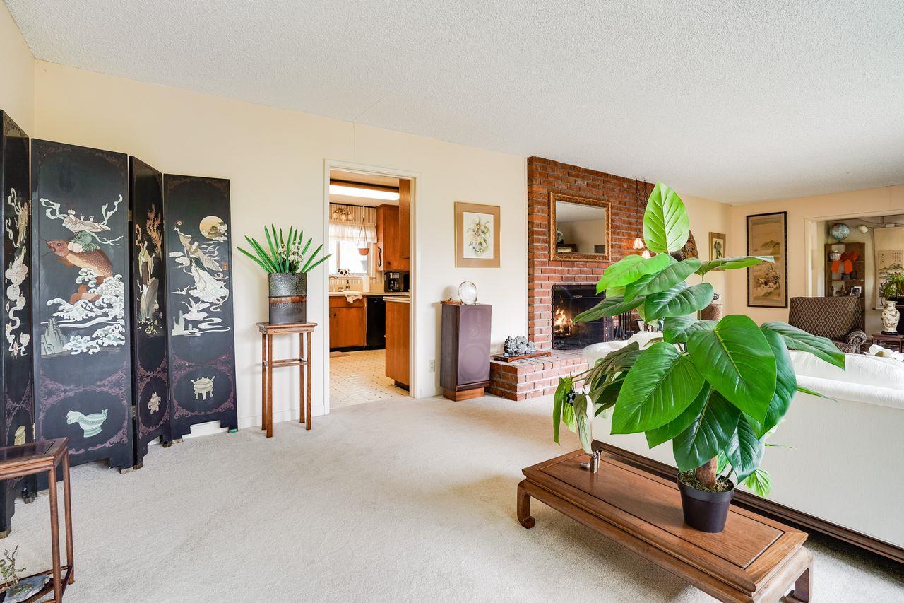 3 Forest Knoll Road Monterey, CA 93940 - Photo 47 of 63 a living room with furniture potted plant and a window