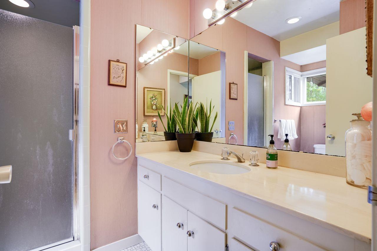 3 Forest Knoll Road Monterey, CA 93940 - Photo 50 of 63 a bathroom with a sink and a mirror