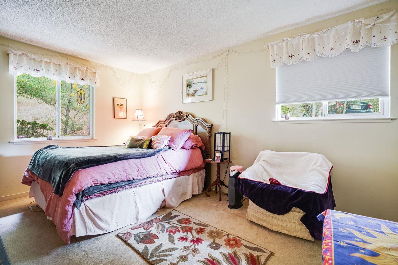 3 Forest Knoll Road Monterey, CA 93940 - Photo 54 of 63 a bedroom with a bed and a window
