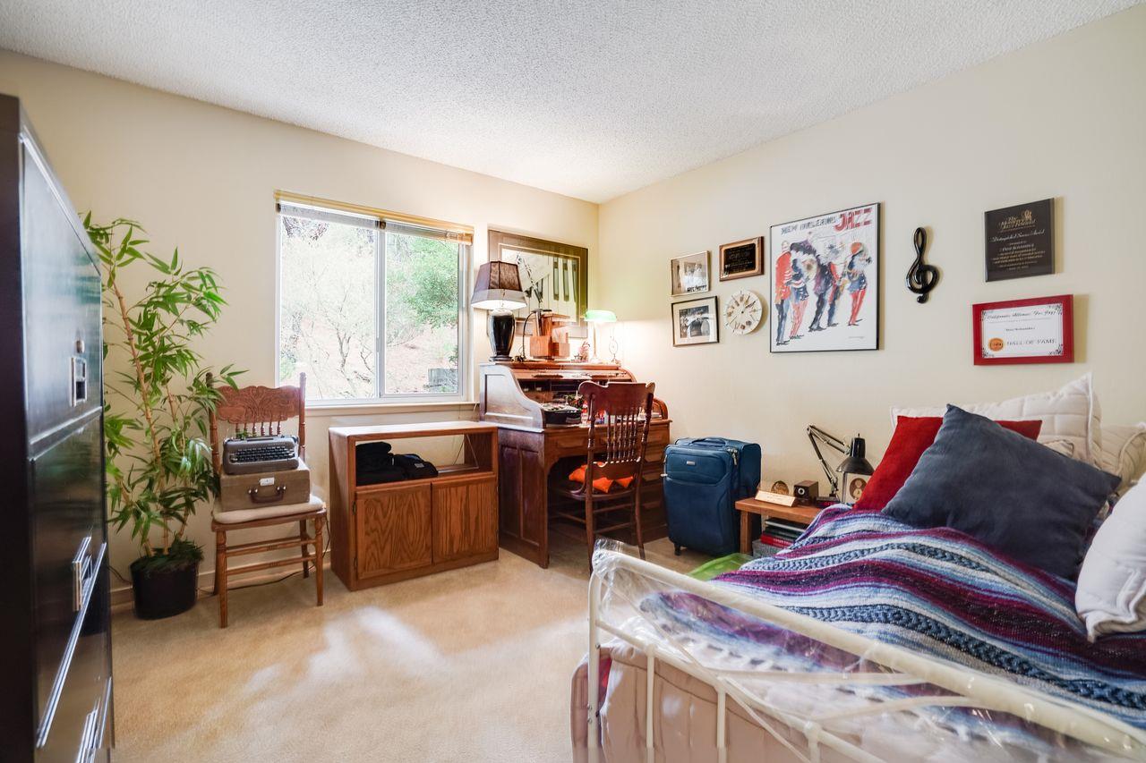 3 Forest Knoll Road Monterey, CA 93940 - Photo 57 of 63 a living room with furniture and a window