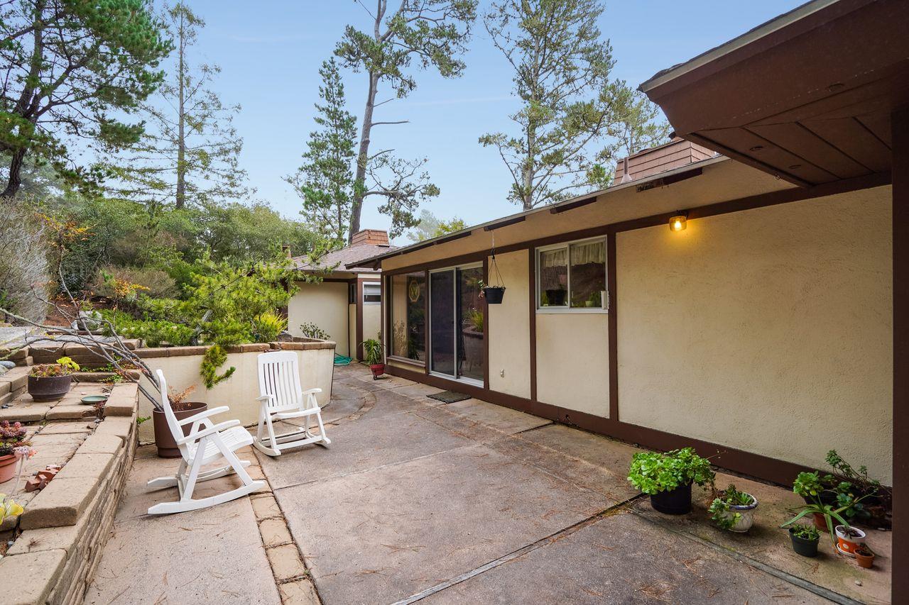 3 Forest Knoll Road Monterey, CA 93940 - Photo 62 of 63 a view of a patio with table and chairs and potted plants