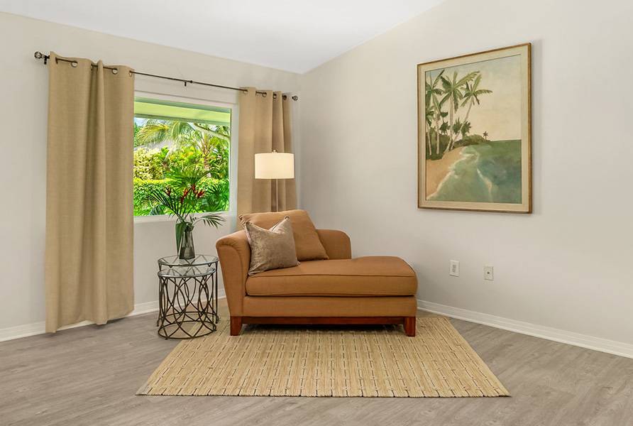 6427 Puupilo Road Kapaa, HI 96746 - Photo 11 of 27 a living room with furniture and a window
