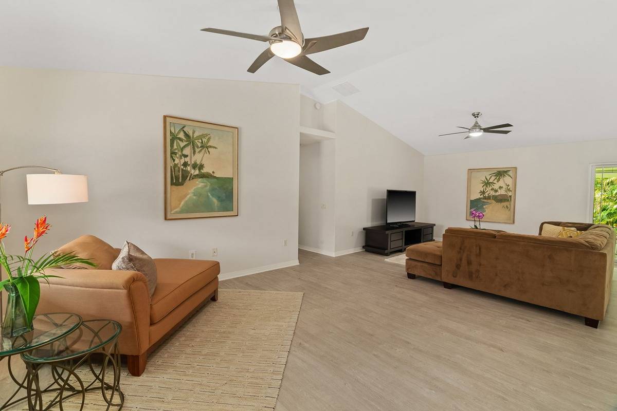 6427 Puupilo Road Kapaa, HI 96746 - Photo 12 of 27 a living room with furniture and a flat screen tv