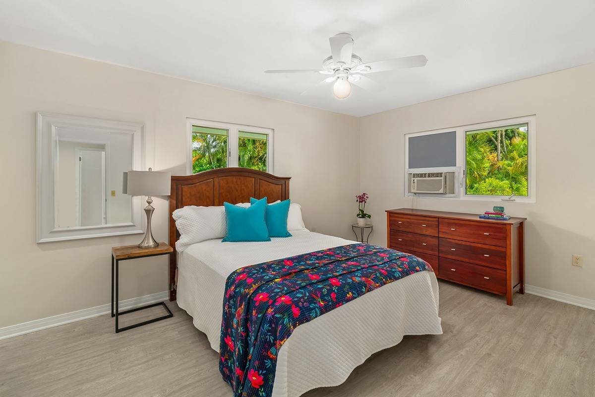 6427 Puupilo Road Kapaa, HI 96746 - Photo 17 of 27 a bedroom with a bed and a window