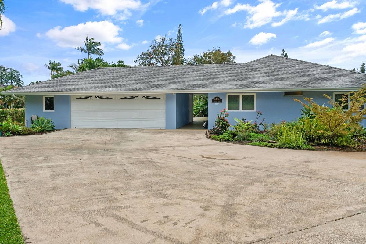 6427 Puupilo Road Kapaa, HI 96746 - Photo 3 of 27 front view of a house with a yard