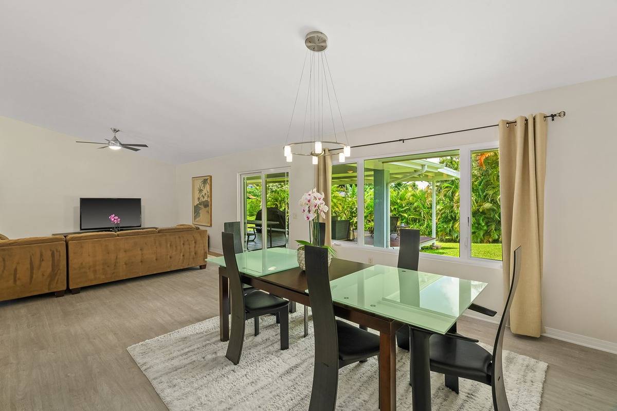 6427 Puupilo Road Kapaa, HI 96746 - Photo 9 of 27 a view of a dining room with furniture window and wooden floor