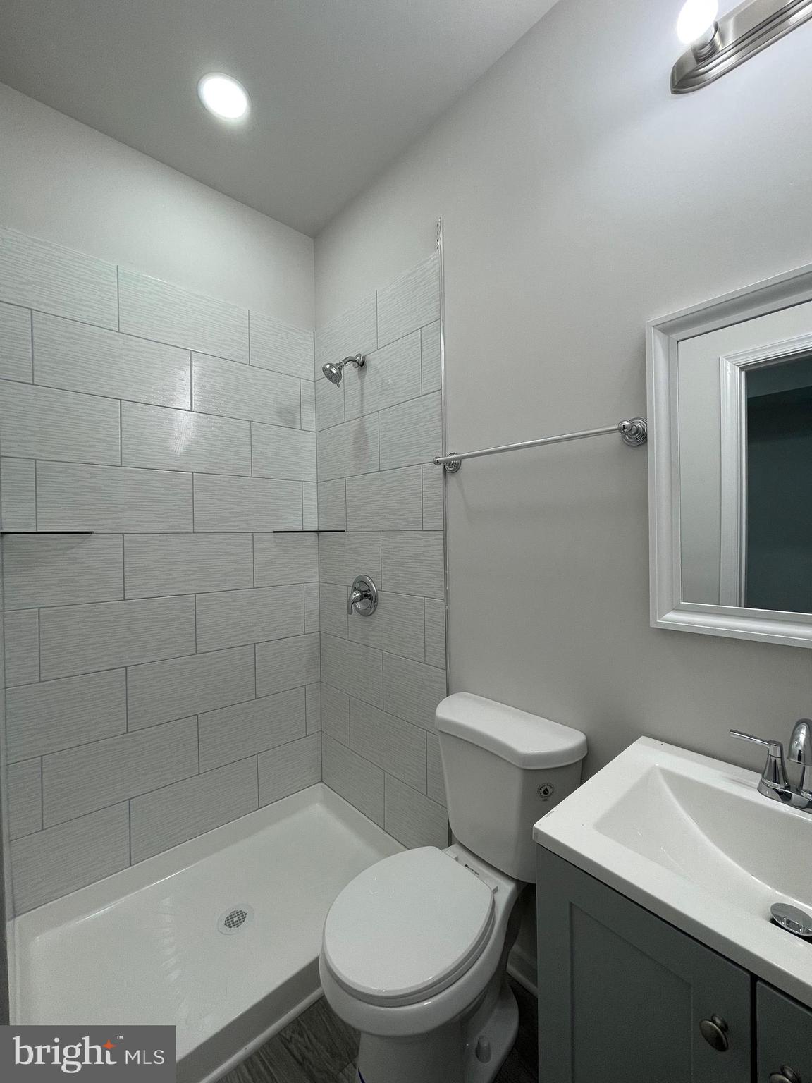 1806 East Lanvale Street Baltimore, MD 21213 - Photo 7 of 23 a bathroom with a sink toilet and shower