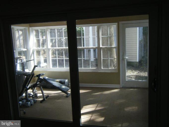 5981 Grand Banks Road Columbia, MD 21044 - Photo 17 of 27 View from family room to sunroom