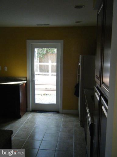 5981 Grand Banks Road Columbia, MD 21044 - Photo 23 of 27 View from dining to back door from kitchen