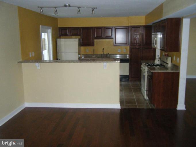 5981 Grand Banks Road Columbia, MD 21044 - Photo 9 of 27 View from family room to kitchen