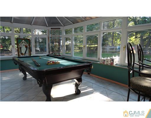 740 Old Raritan Road Edison, NJ 08820 - Photo 17 of 24 a room with table and chairs