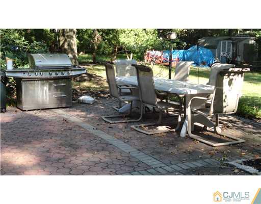 740 Old Raritan Road Edison, NJ 08820 - Photo 20 of 24 a view of a room with gym equipment