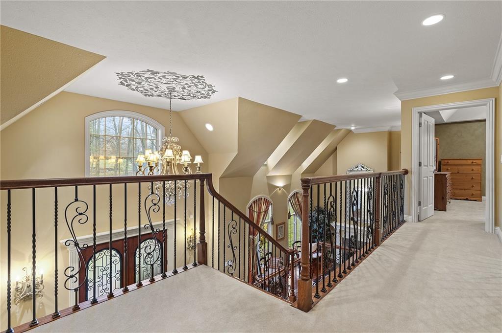 1607 Fieldstone Lane Sewickley, PA 15143 - Photo 23 of 48 The above hallway has views of both sides over looking to downstairs.
