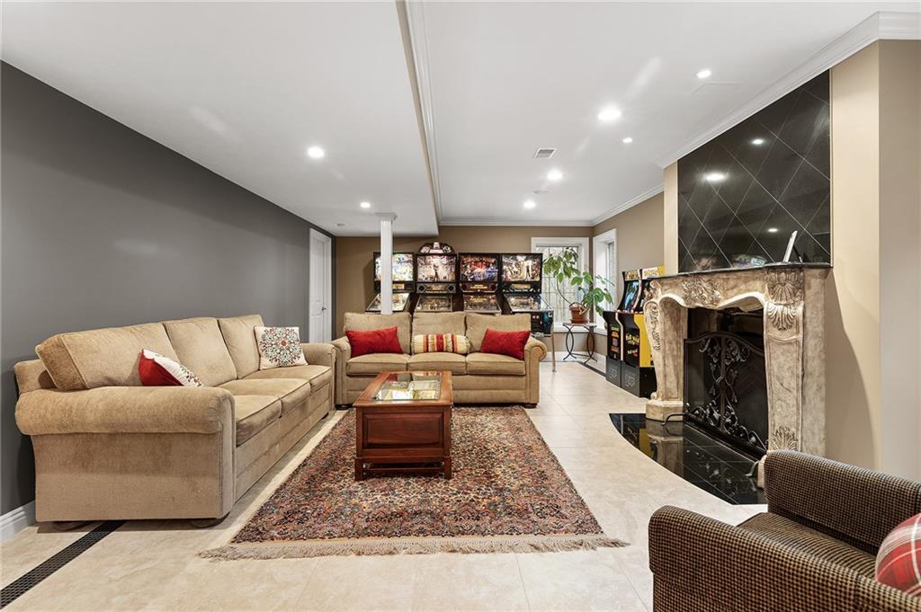 1607 Fieldstone Lane Sewickley, PA 15143 - Photo 39 of 48 Marble flooring, recessed lighting throughout this space.