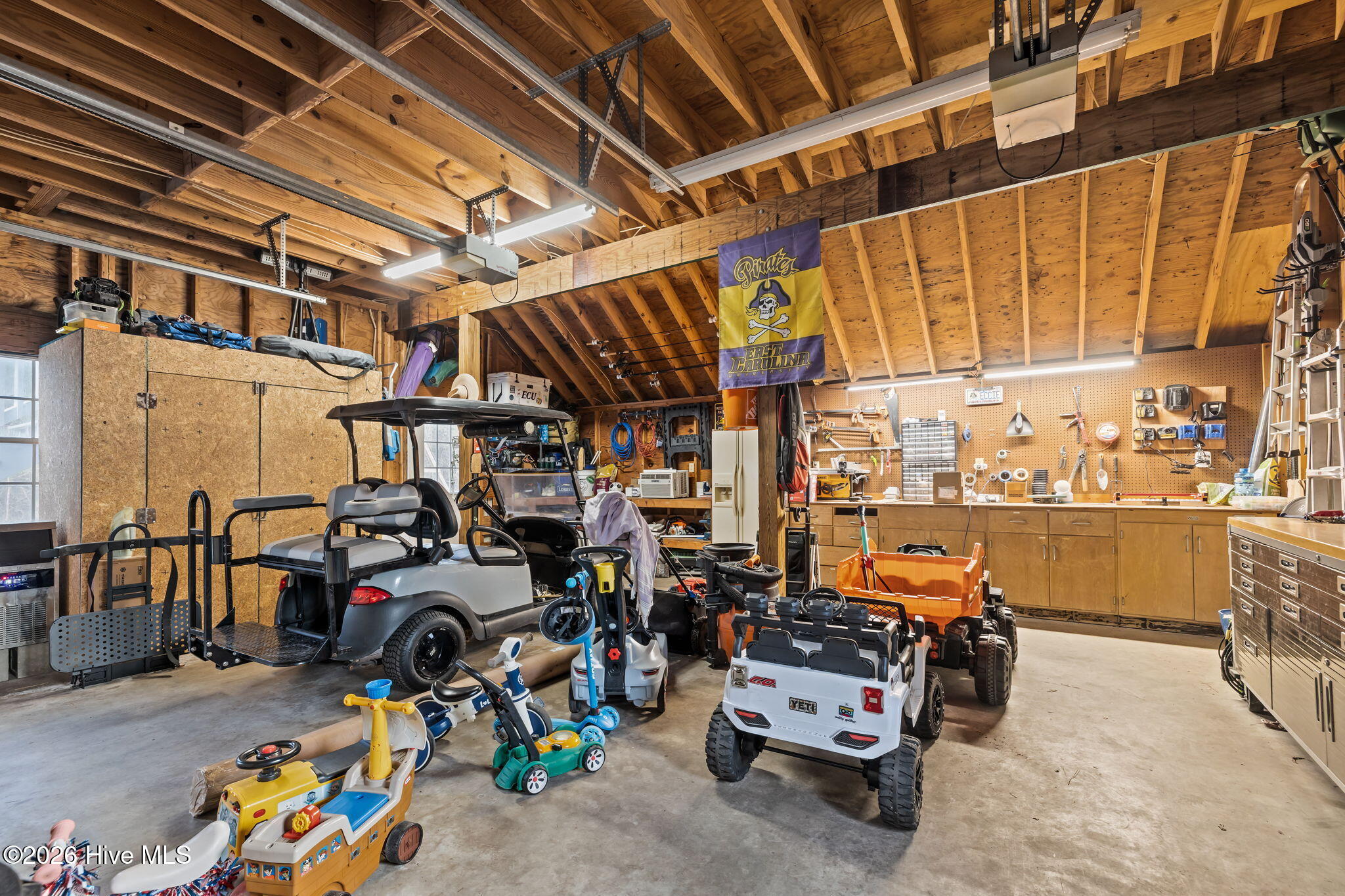 2707 East Fairway Road Morehead City, NC 28557 - Photo 45 of 59 2 car garage with lots of storage